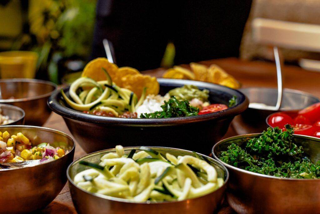 green vegetable dish on brown ceramic bowl